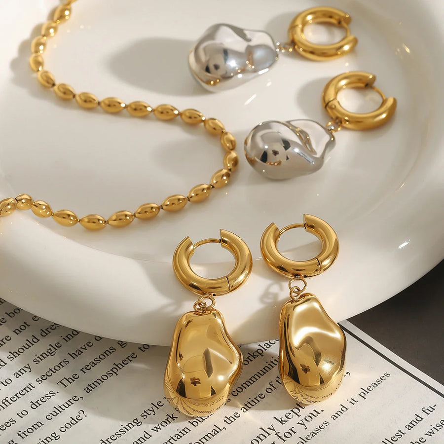 Elegant Gold Teardrop Dangle Earrings with Abstract Design