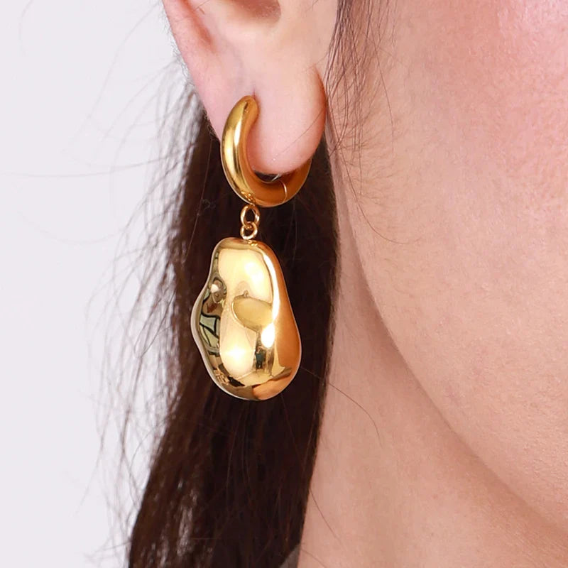 Elegant Gold Teardrop Dangle Earrings with Abstract Design