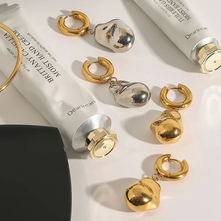 Elegant Gold Teardrop Dangle Earrings with Abstract Design